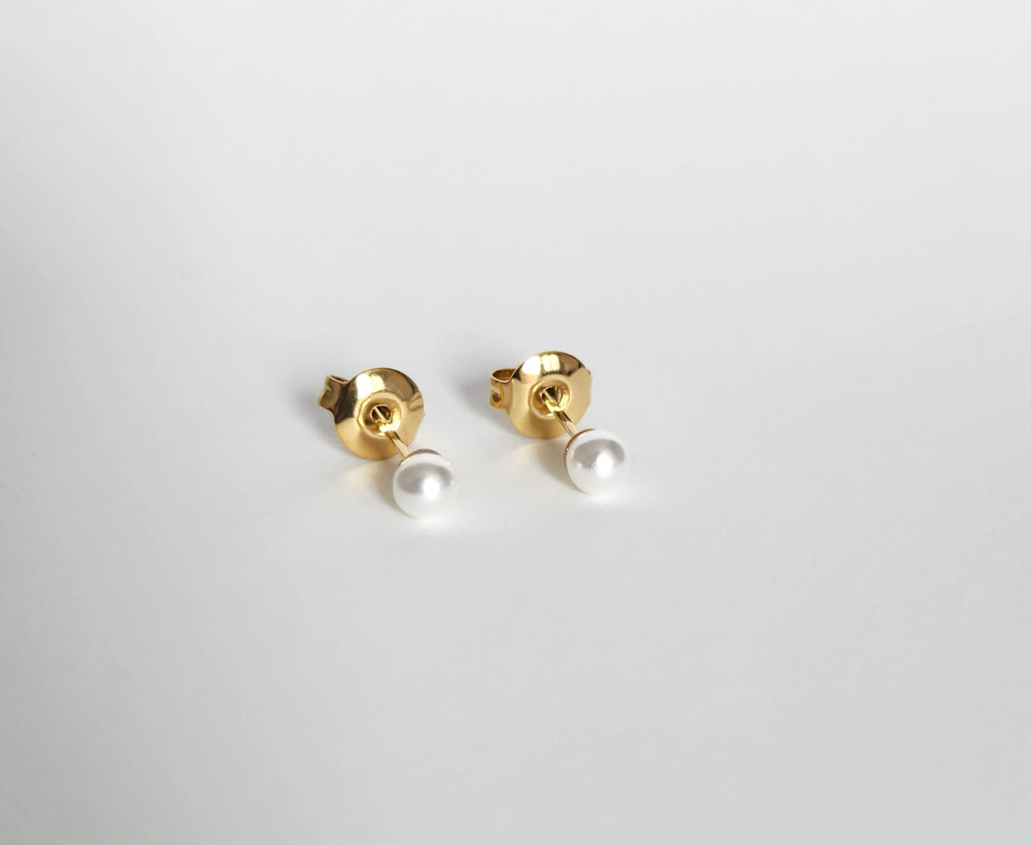 Boucle d'oreille petite perle