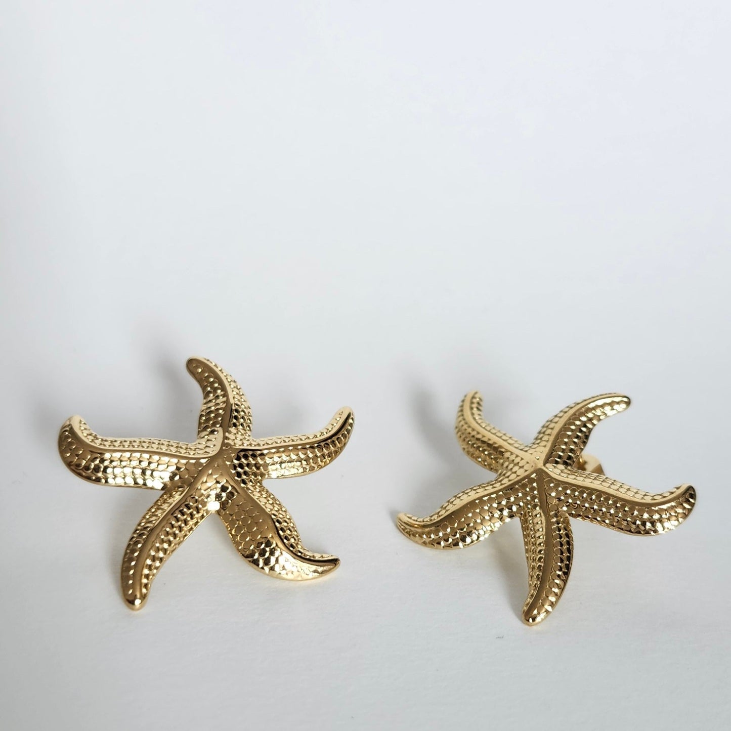Boucle étoile de mer doré