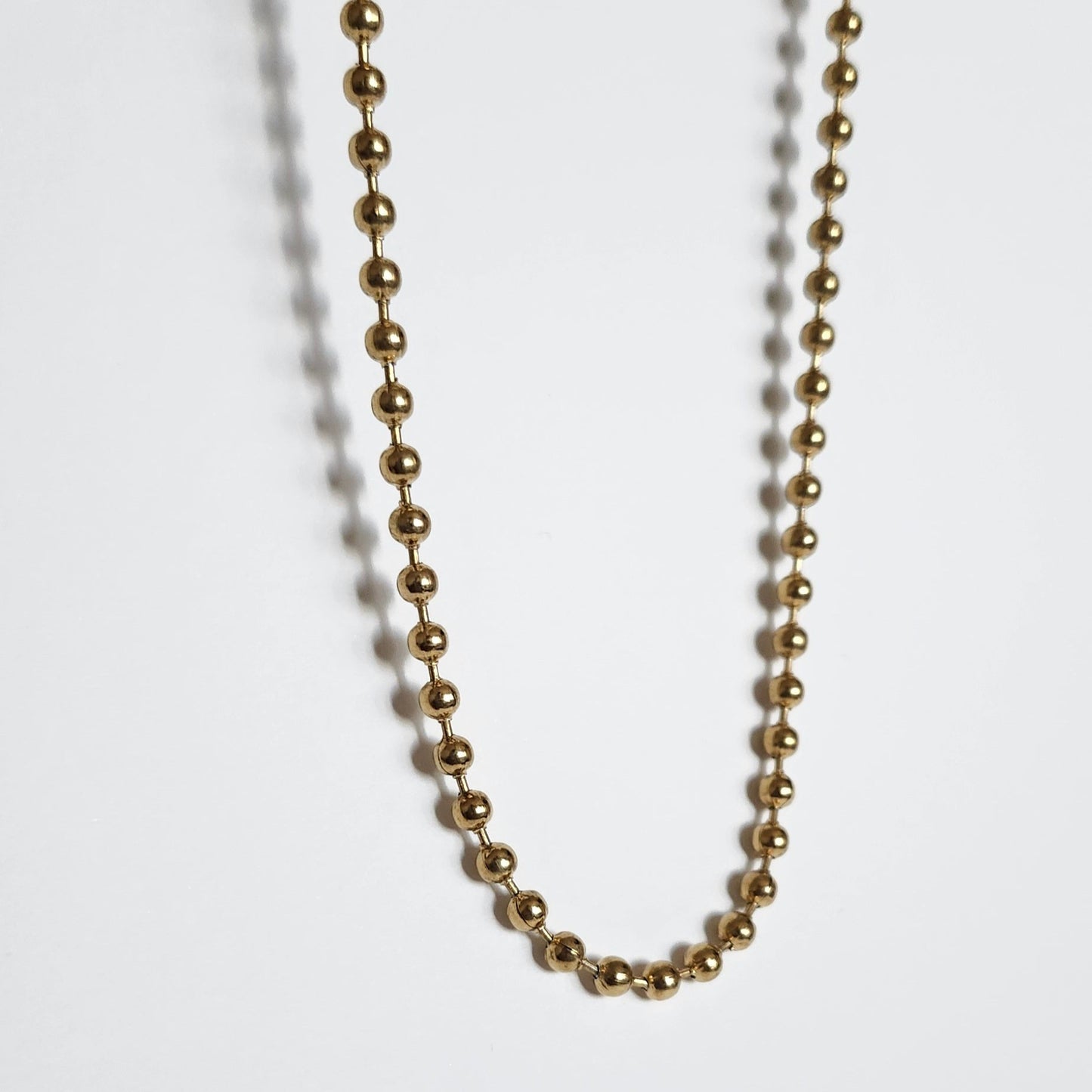 Collier perle doré
