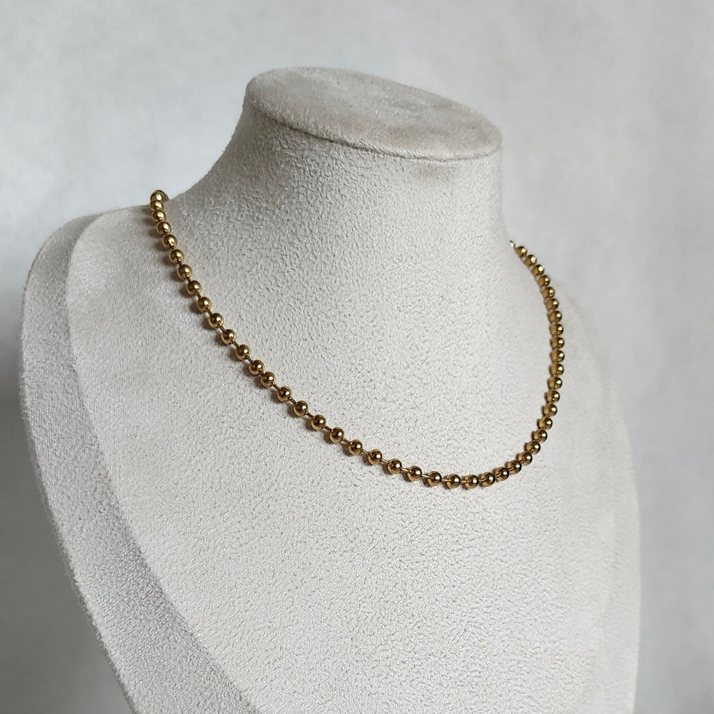 Collier perle doré