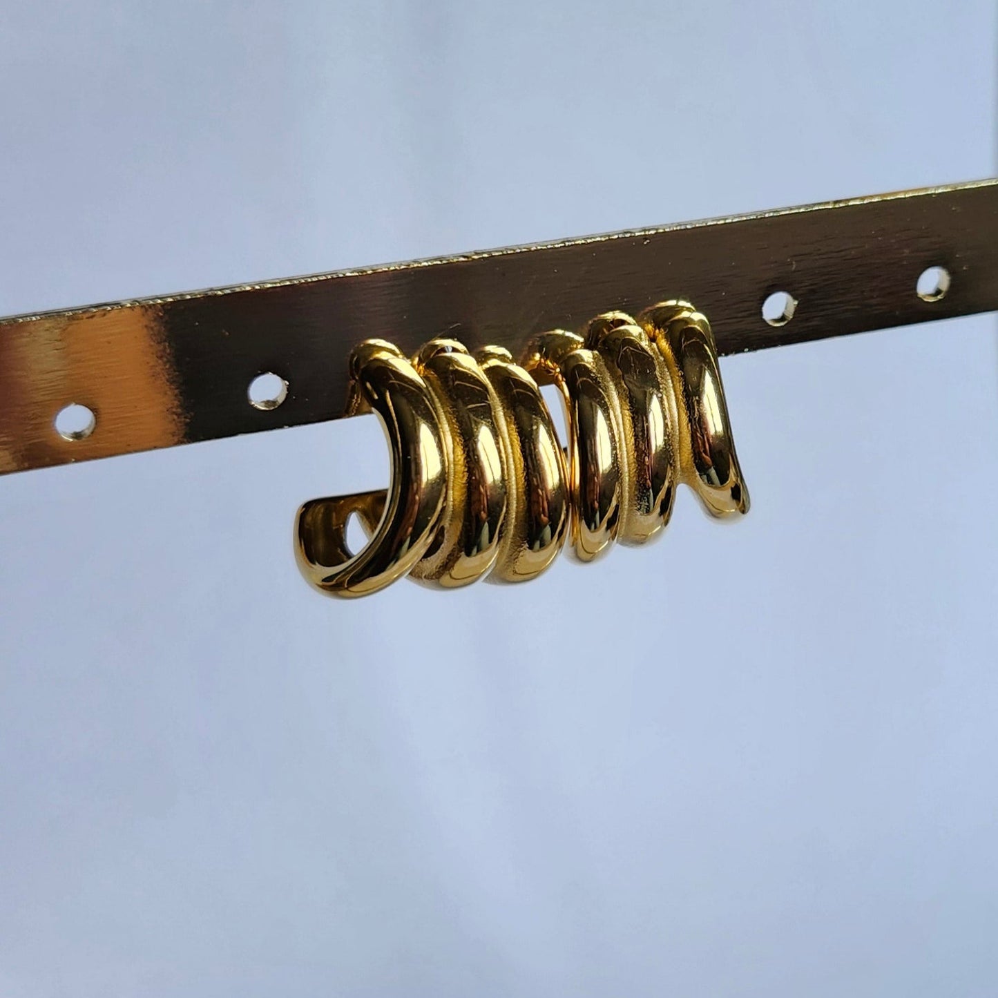 Boucles d'oreilles triple ligne courbé