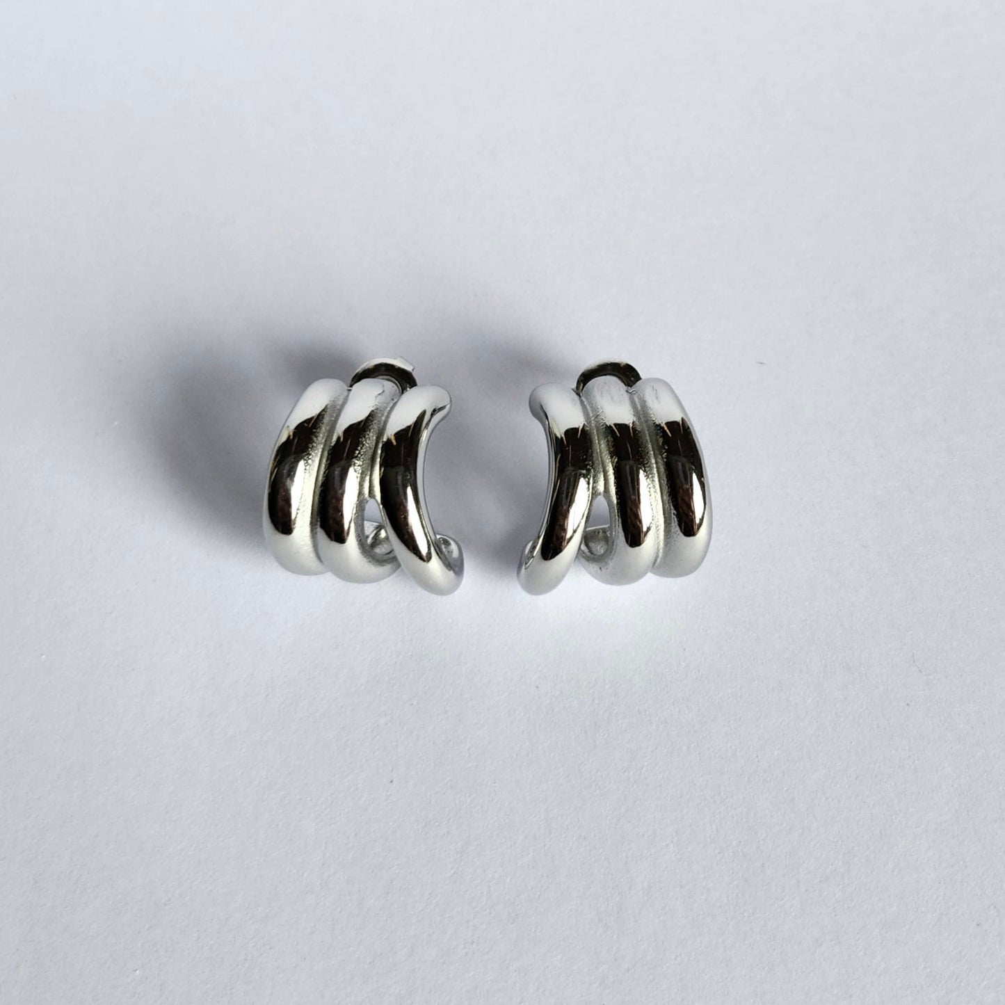 Boucles d'oreilles triple ligne courbé