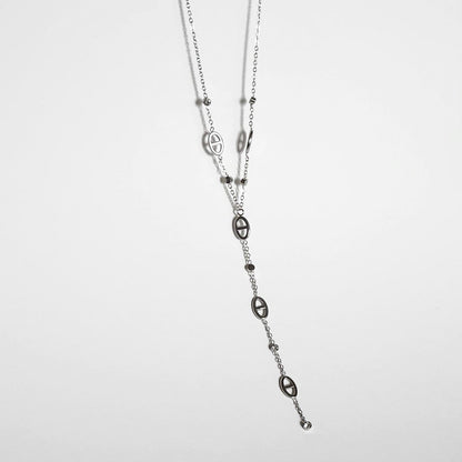 Collier orbe cravate