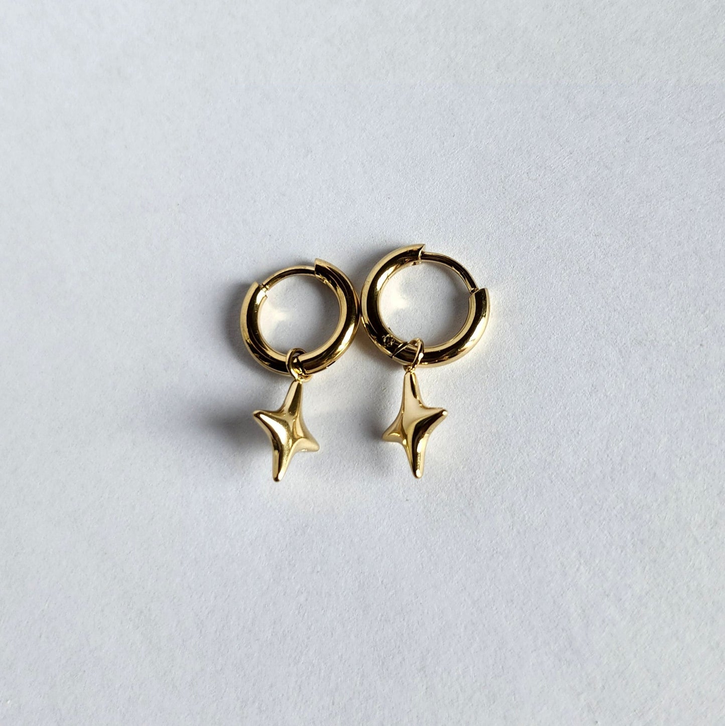 Boucles d'oreilles étoile pendante