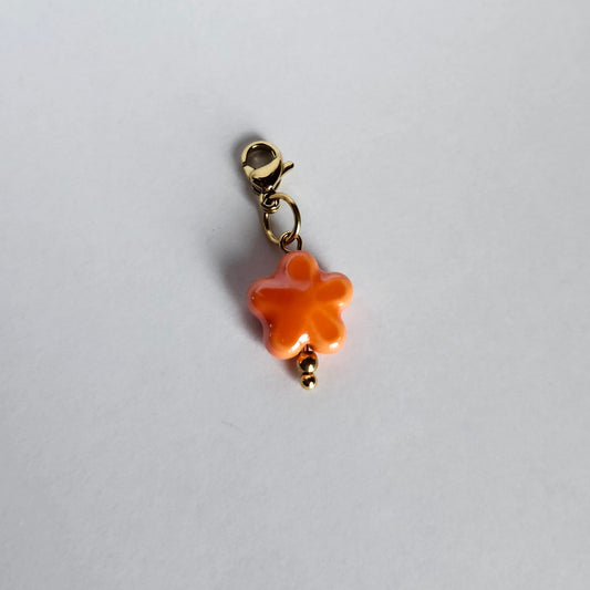 Charms fleur orange