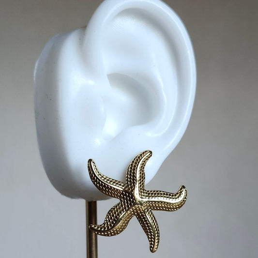 Boucle étoile de mer doré