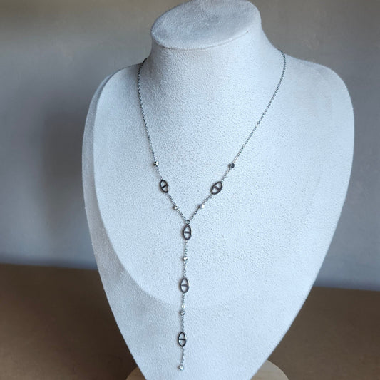 Collier orbe cravate